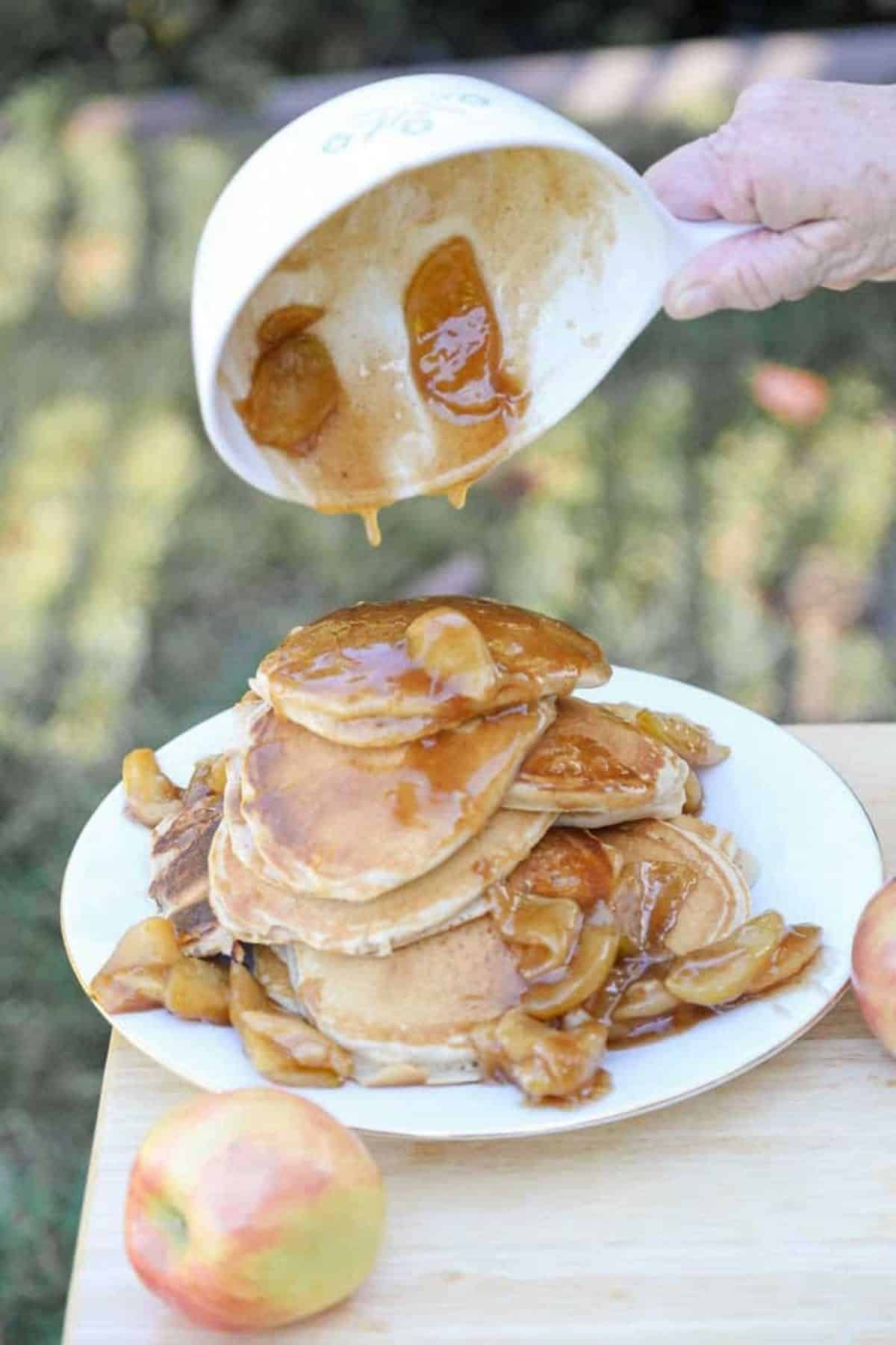 apple granola pancakes with caramel drippings