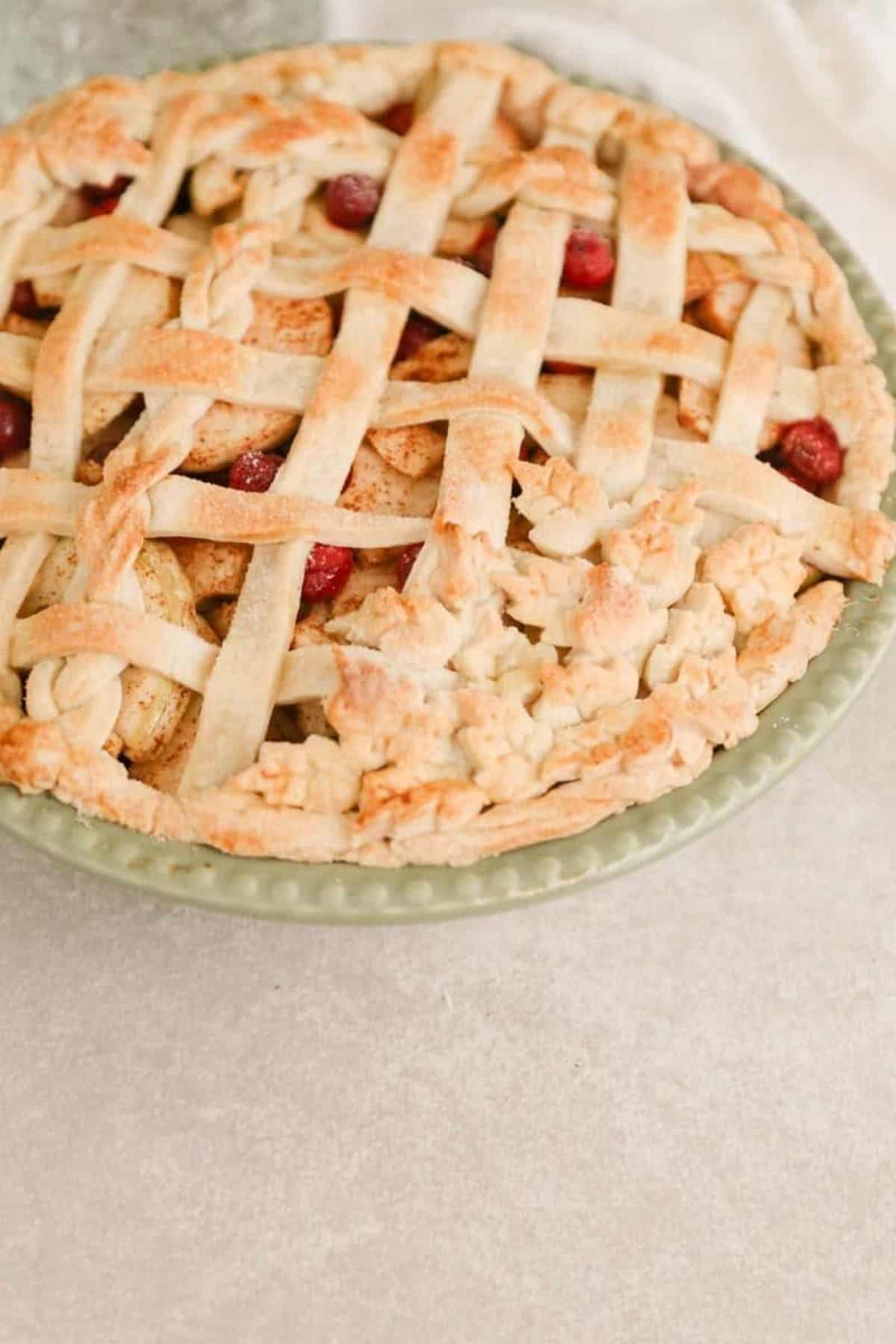 cranberry apple pie in a dish