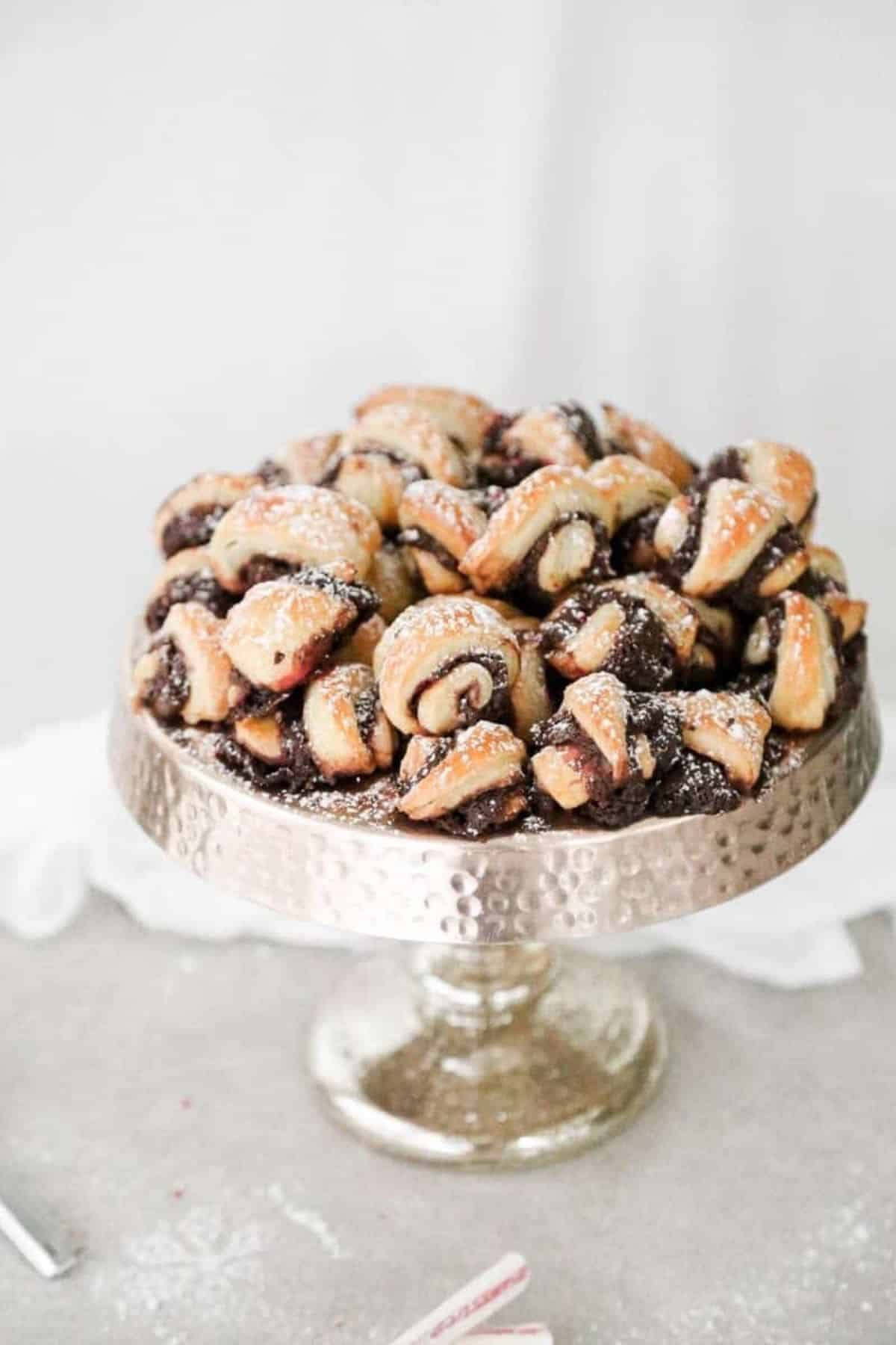 chocolate peppermint rugelach on a cake stand