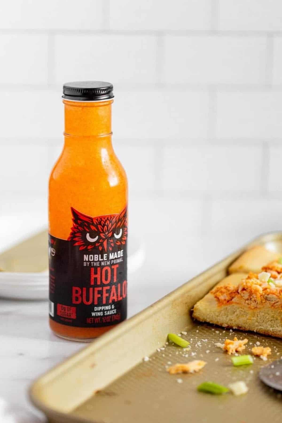 The new primal hot buffalo sauce and pizza