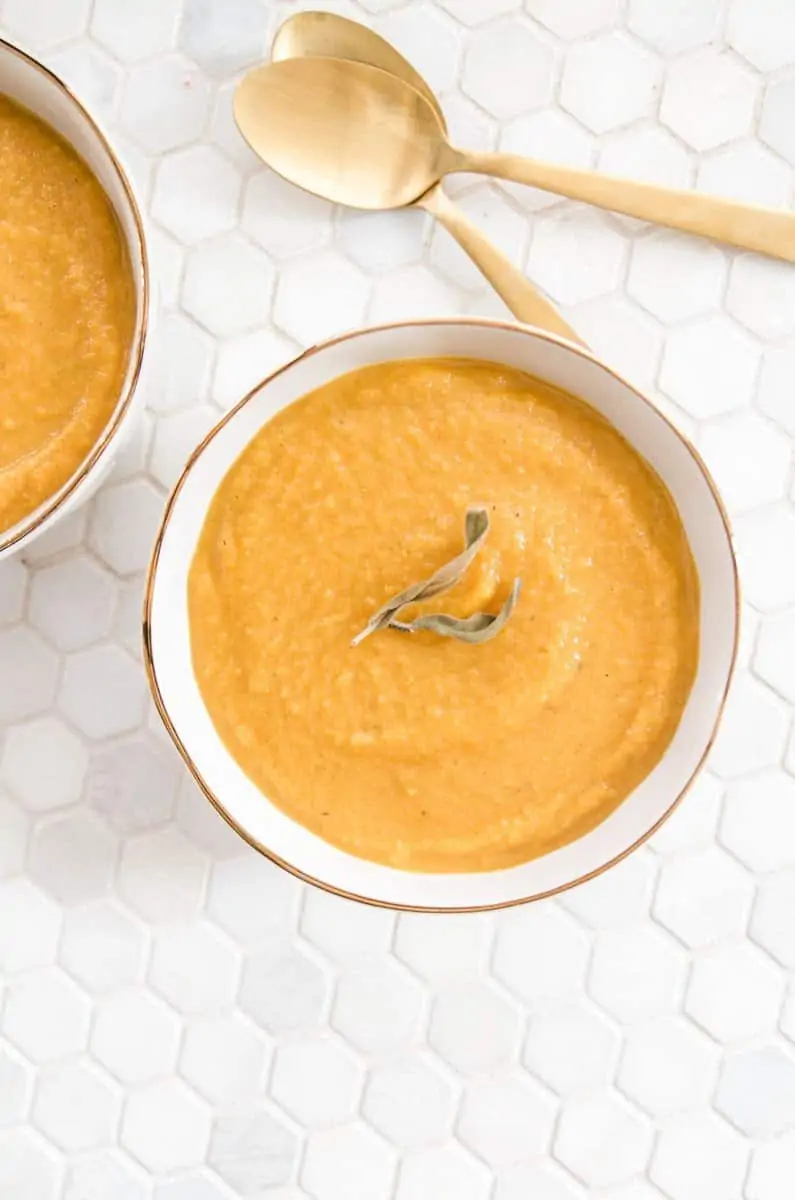butternut squash soup on a table
