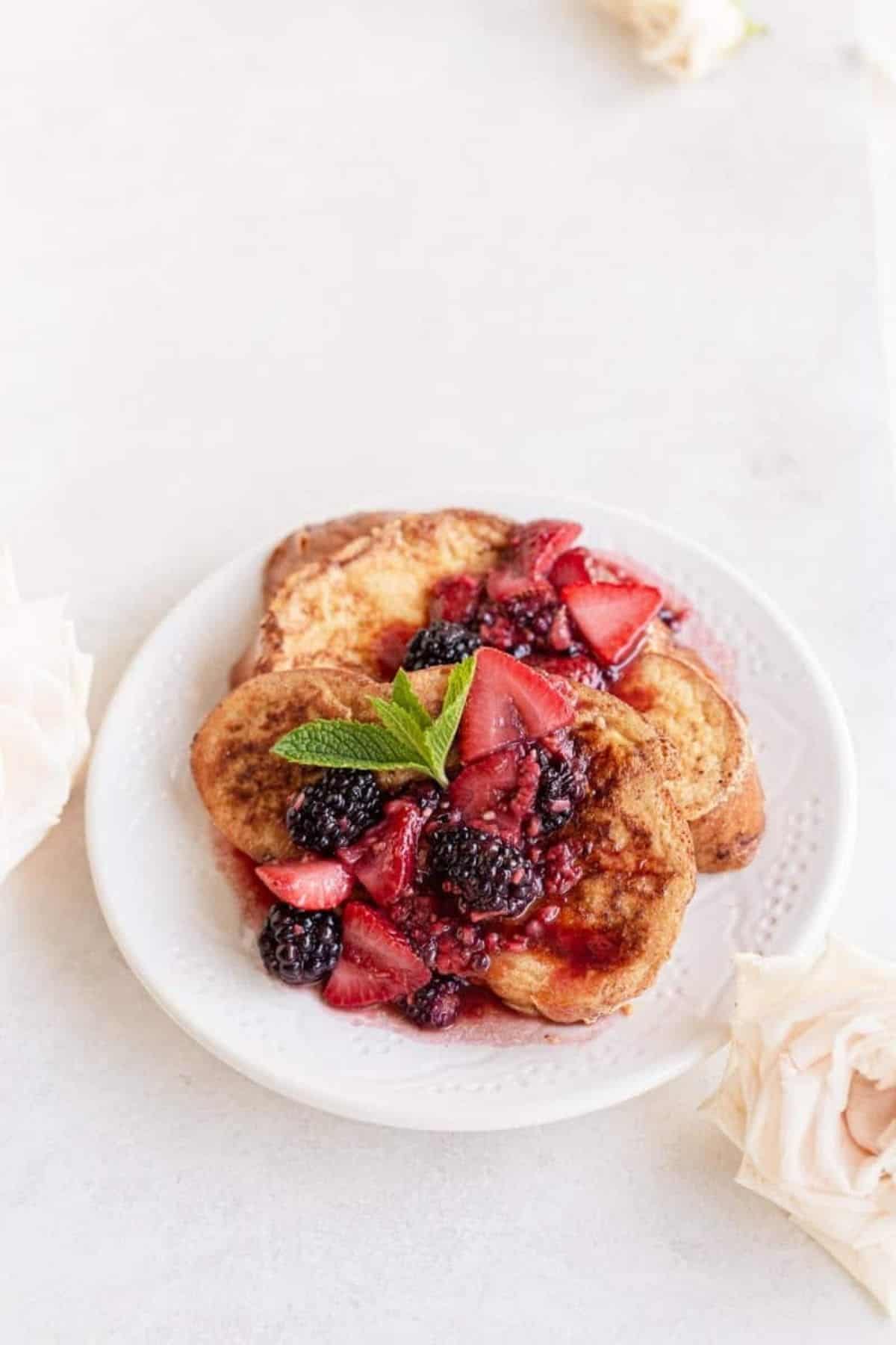 challah french toast with berry compote and mint