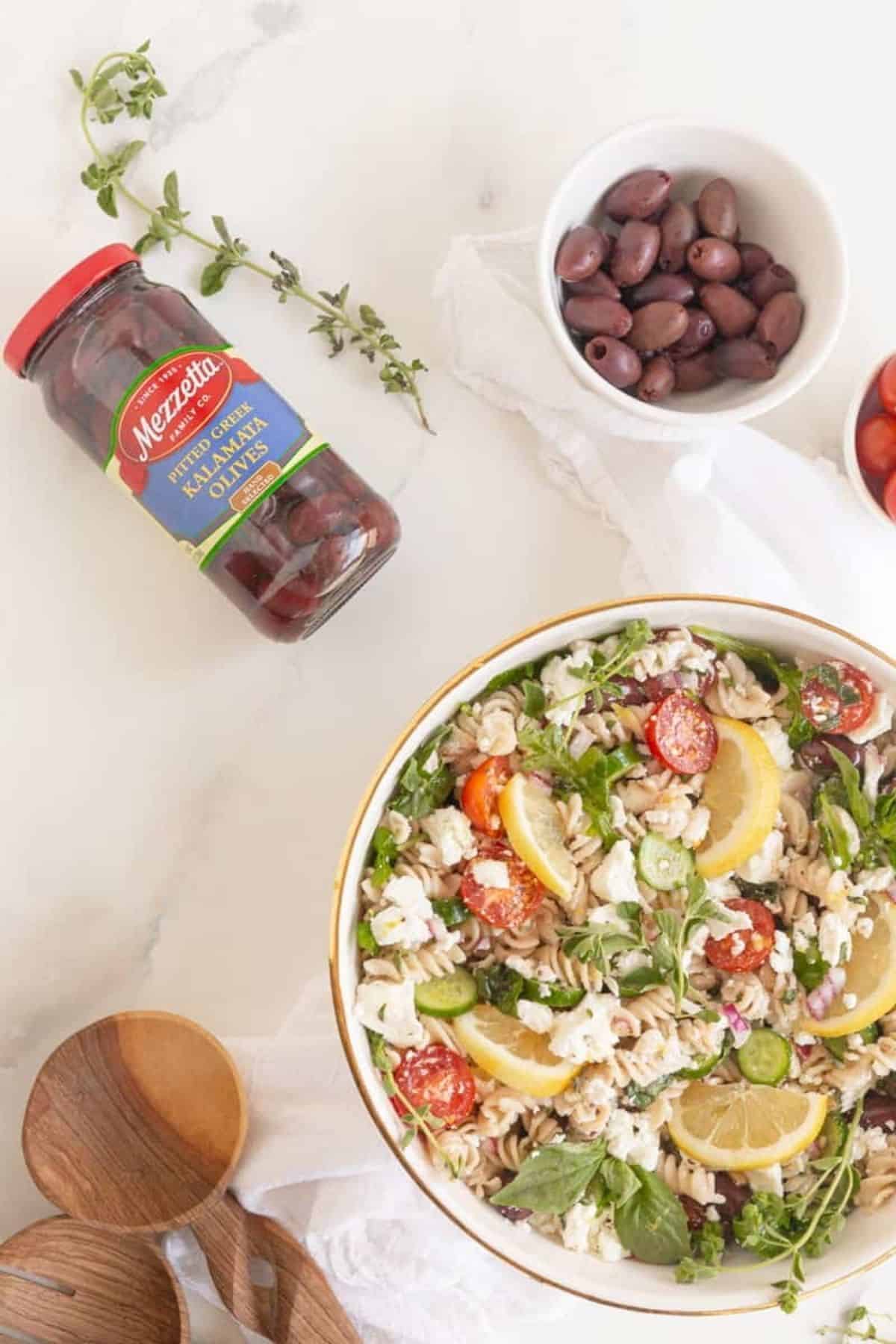overhead of pasta salad in bowl with ingredients