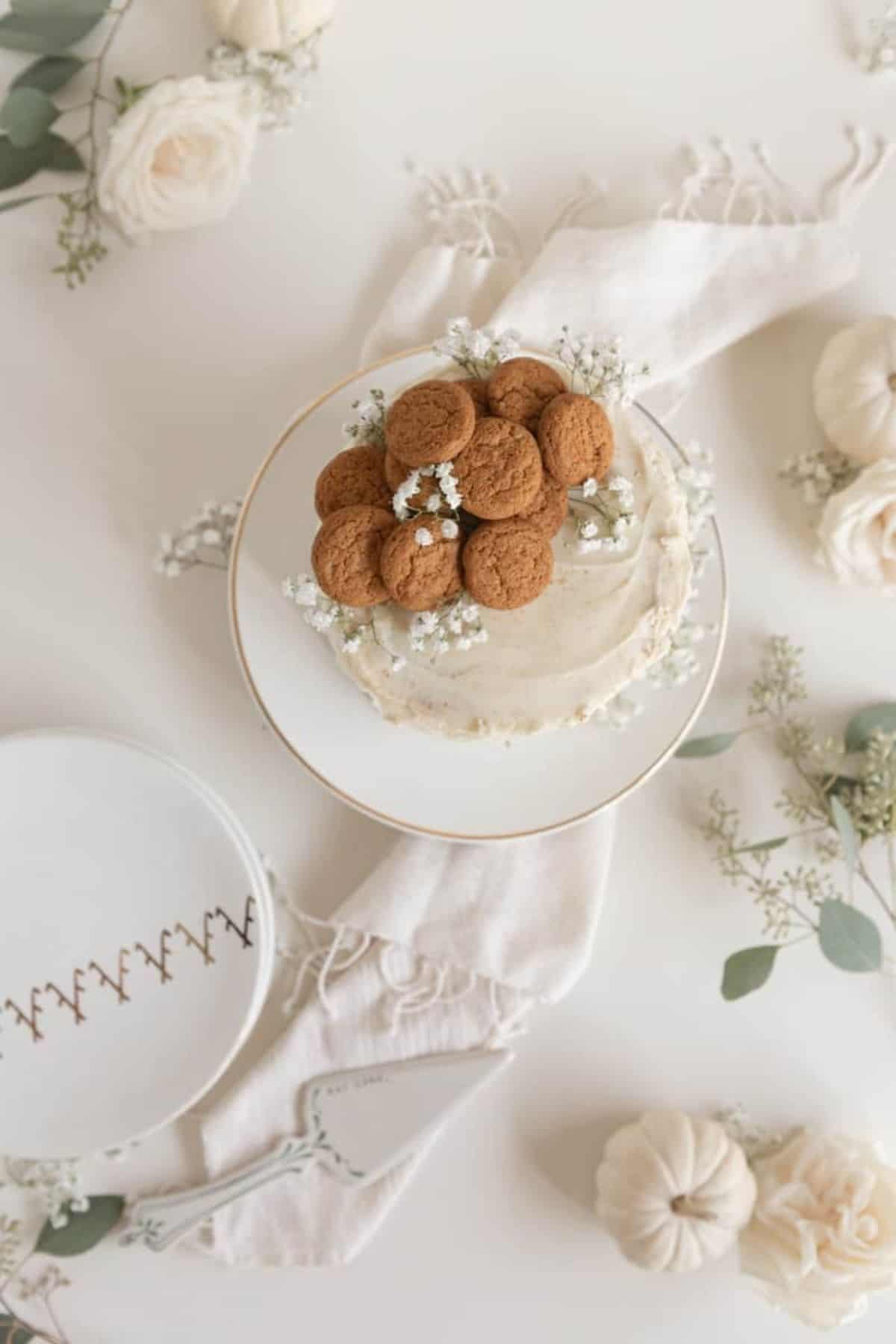 pumpkin pie spice cake with plate and flowers