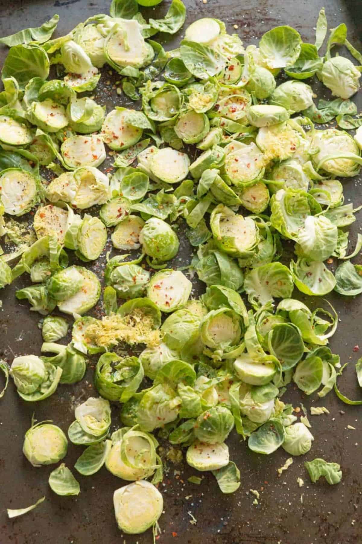 raw brussel sprouts on sheet pan