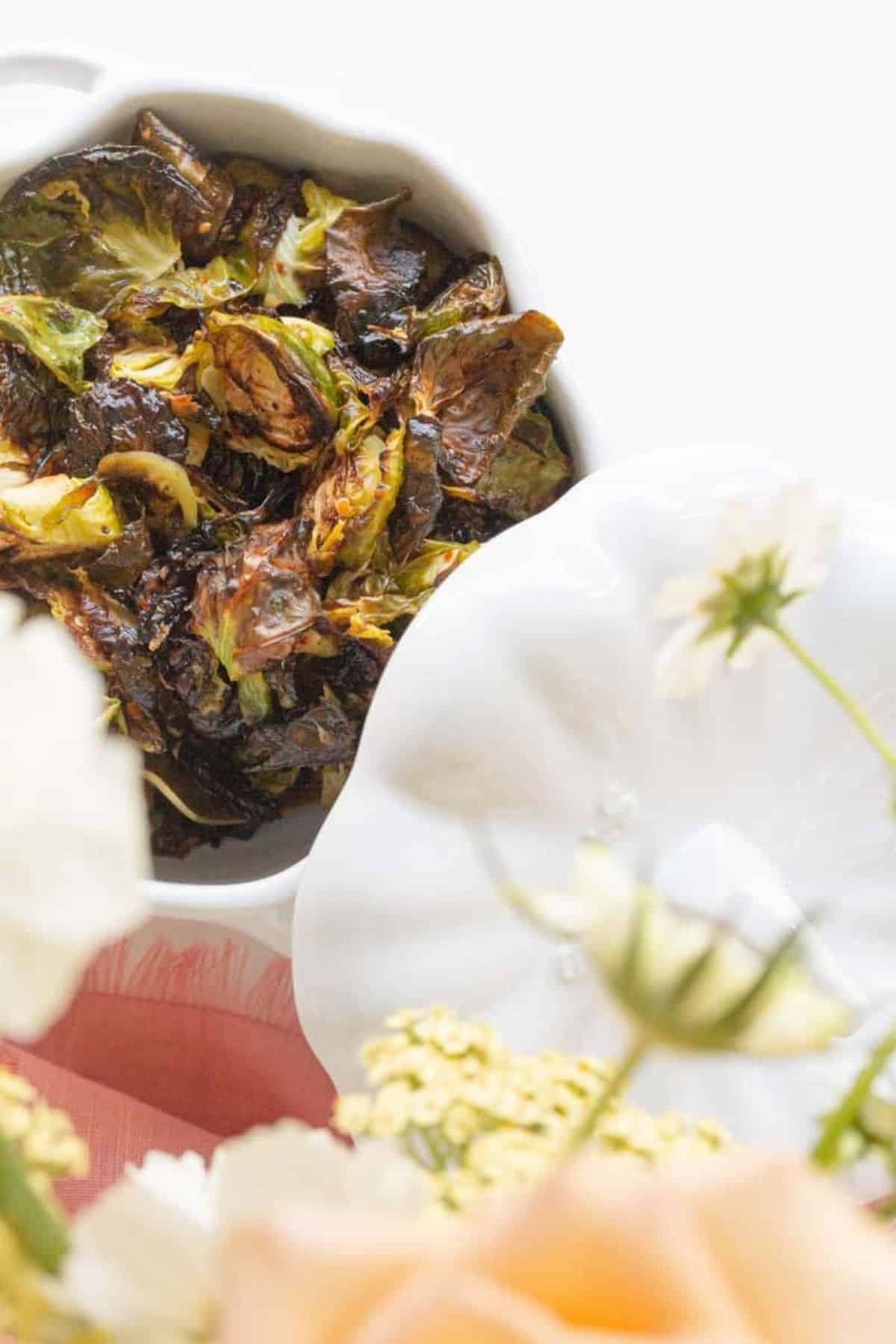 close up of roasted Brussel sprouts in bowl