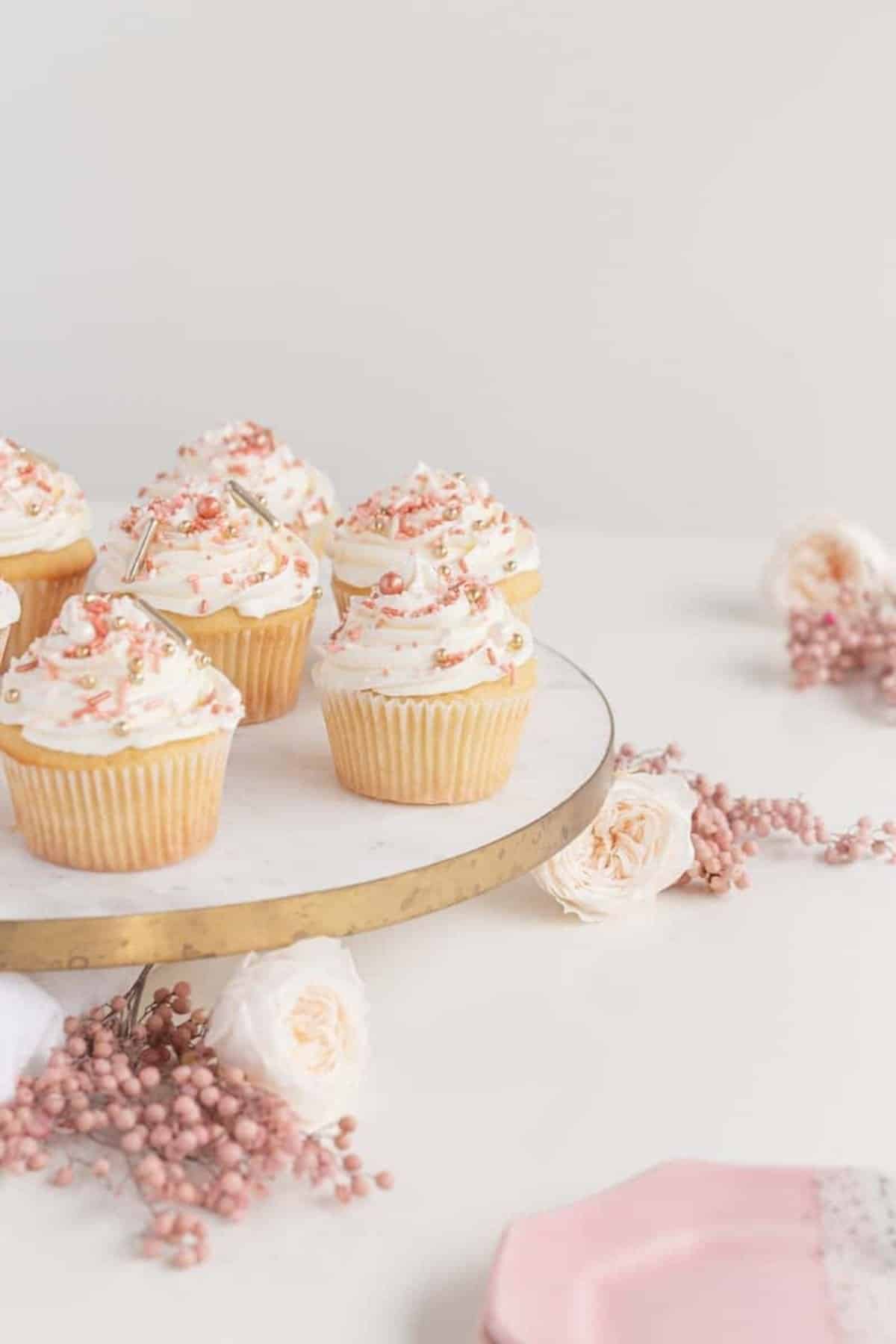 cupcakes with pink sprinkles and flowers