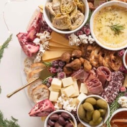 cheese and appetizer platter with holiday decor