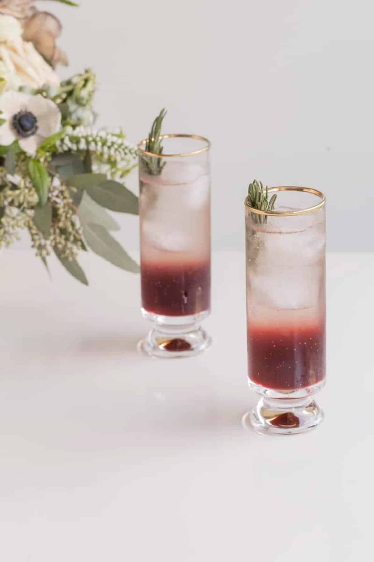 grape cocktail in two glasses