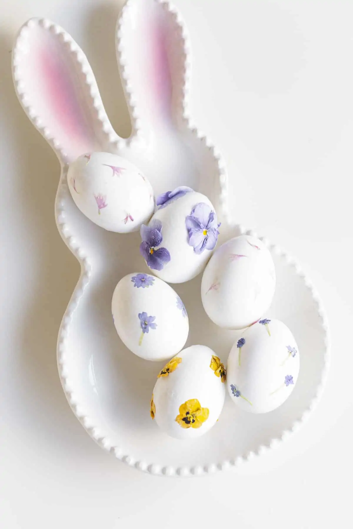 easter eggs on a bunny plate with flowers