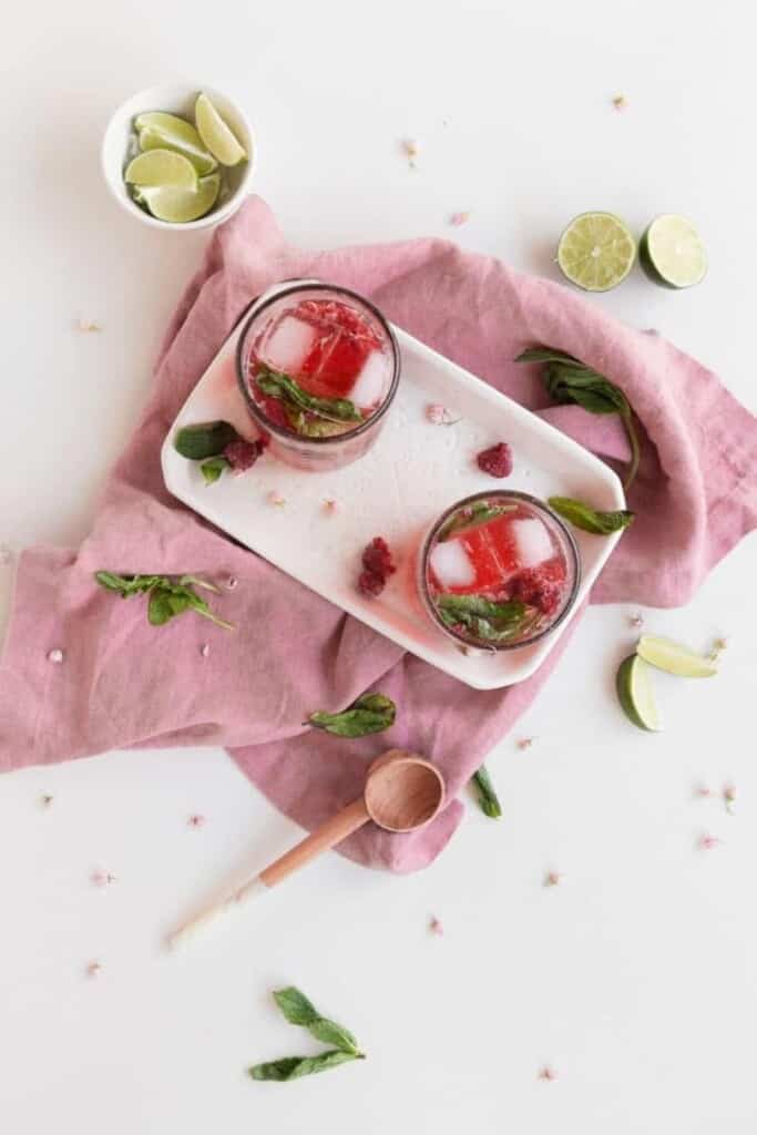 raspberry mojitos with mint and limes