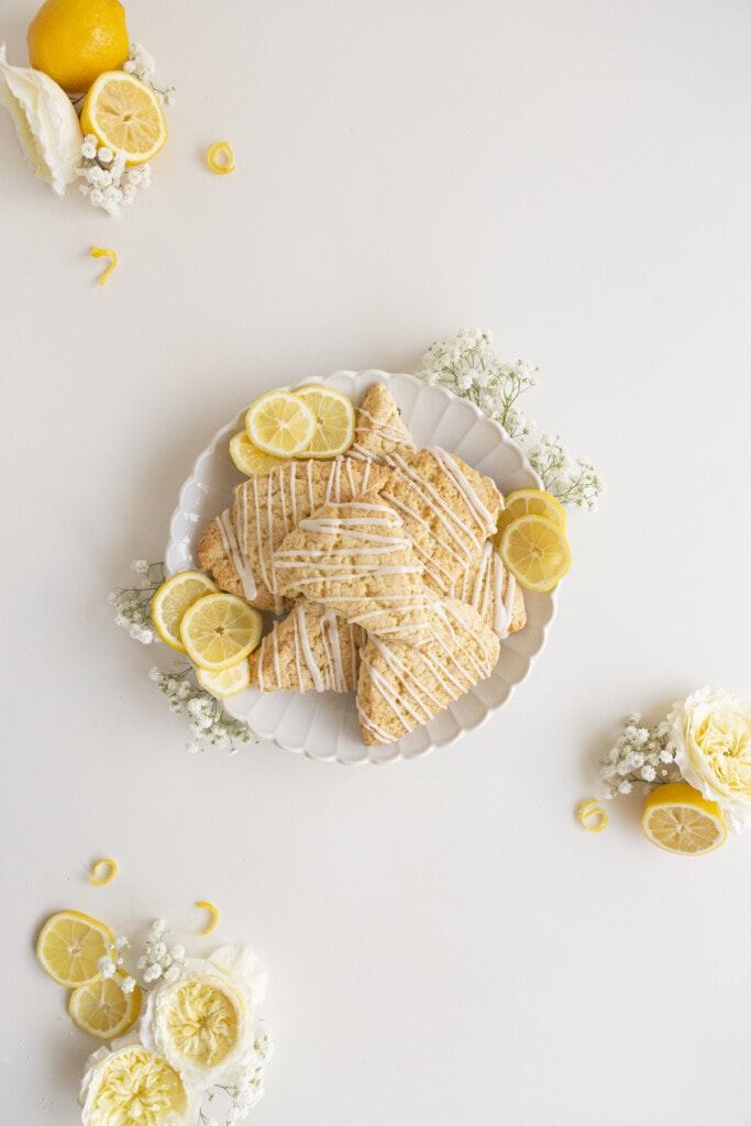 lemon scones with slices of lemon and flowers