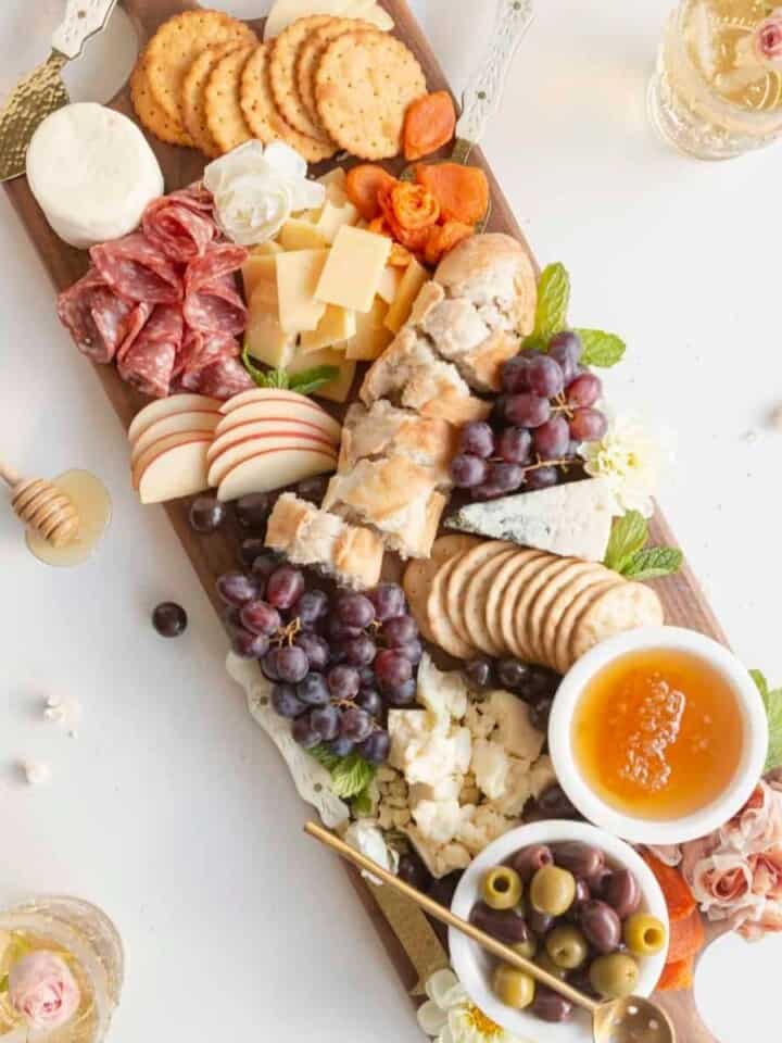 simple charcuterie boards with cheeses, meats, and fruits from above