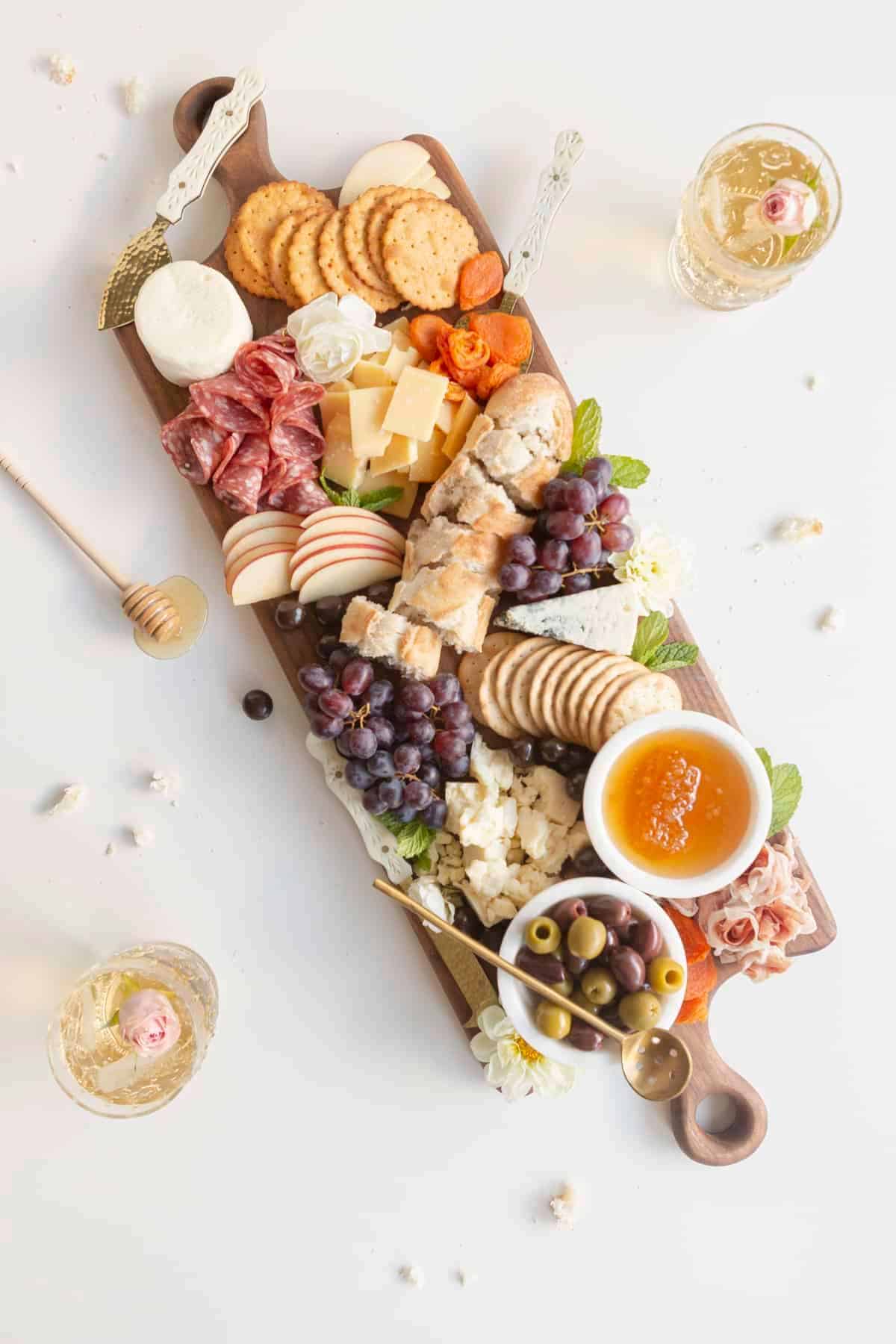 simple charcuterie boards with cheeses, meats, and fruits from above