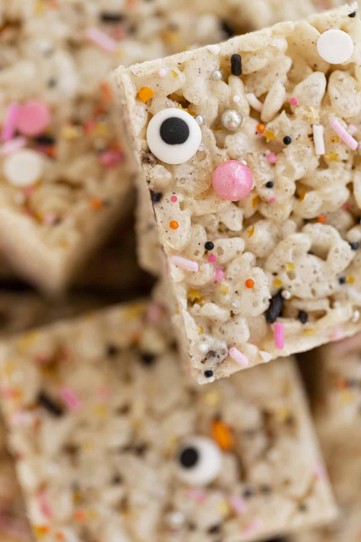rice krispie treats with spinkles on top of other rice krispie treats