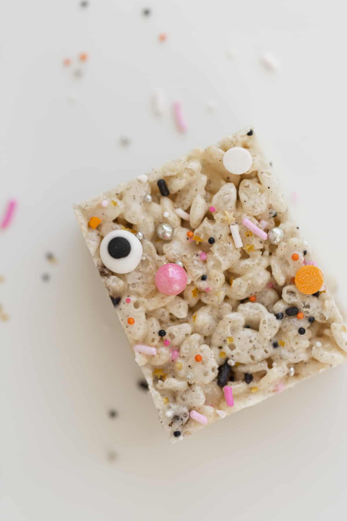 halloween rice krispy treats with sprinkles and a googly eye