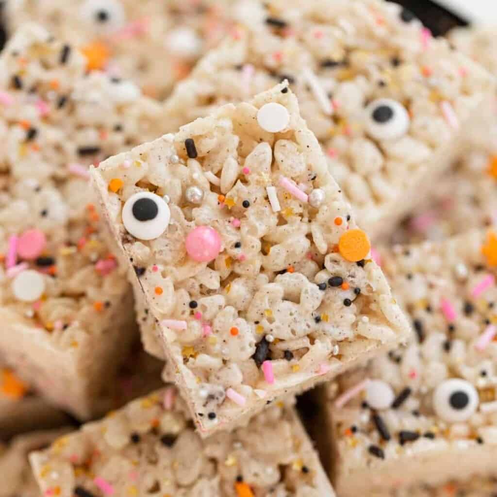 rice krispie treats with pink and orange sprinkles